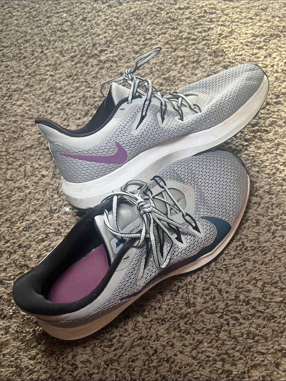 Nike Women’s Light Gray Running Shoes with Purple Swoosh